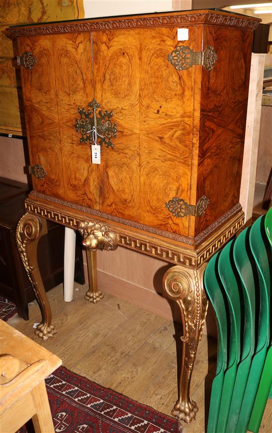 A walnut and gilt cocktail cabinet on stand W.100cm